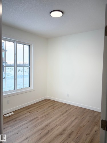 450 Crystal Creek Link, Leduc, AB - Indoor Photo Showing Other Room