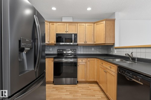 420 12110 106 Avenue, Edmonton, AB - Indoor Photo Showing Kitchen With Double Sink