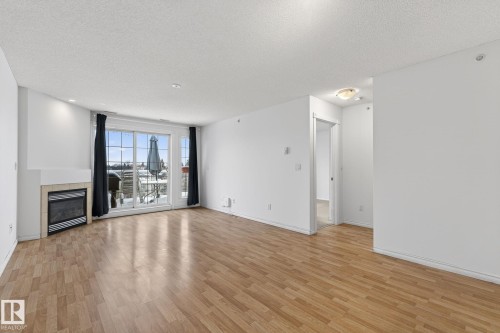 420 12110 106 Avenue, Edmonton, AB - Indoor With Fireplace