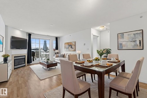 420 12110 106 Avenue, Edmonton, AB - Indoor Photo Showing Dining Room With Fireplace