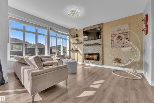 6508 Elston Loop, Edmonton, AB - Indoor Photo Showing Living Room With Fireplace