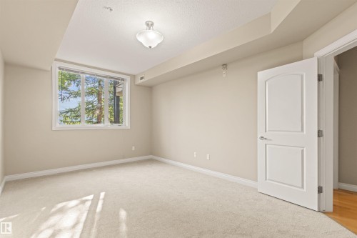 112 12408 15 Avenue, Edmonton, AB - Indoor Photo Showing Other Room
