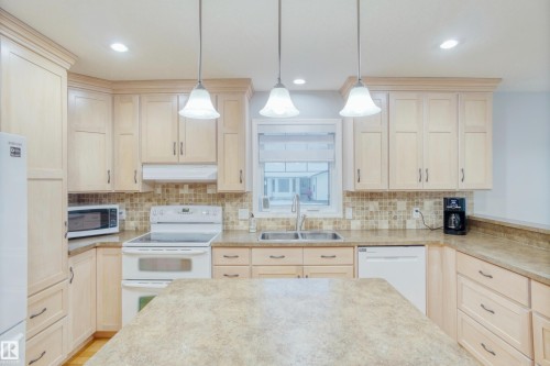 5125 48 Street, Barrhead, AB - Indoor Photo Showing Kitchen With Double Sink