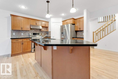 8723 178 Avenue Nw, Edmonton, AB - Indoor Photo Showing Kitchen With Stainless Steel Kitchen With Double Sink