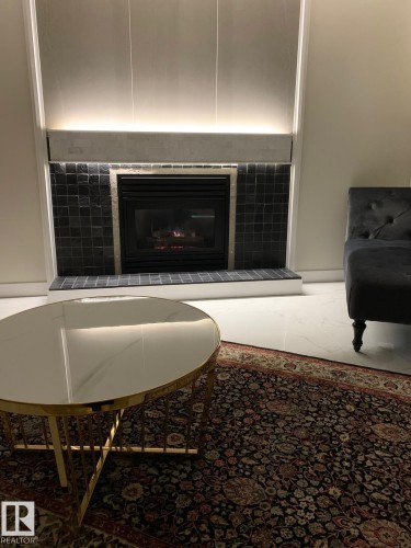 8616 159A Avenue, Edmonton, AB - Indoor Photo Showing Living Room With Fireplace