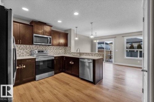 Edmonton, AB - Indoor Photo Showing Kitchen With Stainless Steel Kitchen