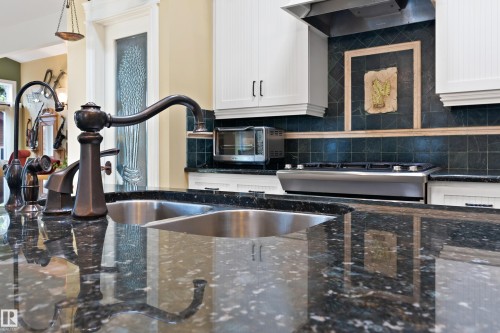 5704 144 Street, Edmonton, AB - Indoor Photo Showing Kitchen With Double Sink