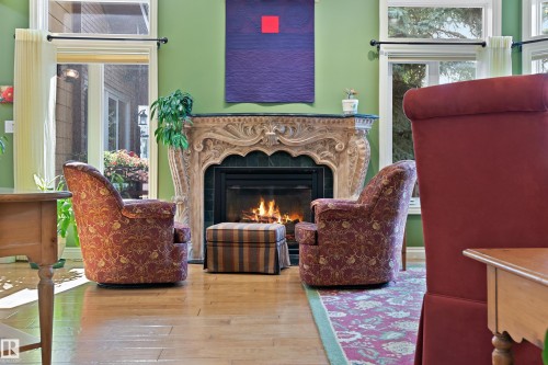5704 144 Street, Edmonton, AB - Indoor Photo Showing Other Room With Fireplace