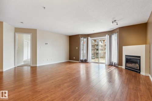 223 4312 139 Avenue, Edmonton, AB - Indoor Photo Showing Living Room With Fireplace