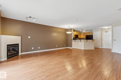 223 4312 139 Avenue, Edmonton, AB - Indoor Photo Showing Living Room With Fireplace