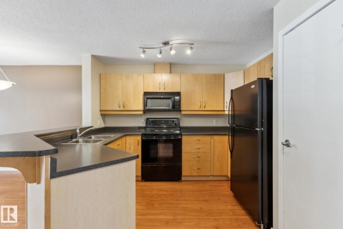 223 4312 139 Avenue, Edmonton, AB - Indoor Photo Showing Kitchen With Double Sink