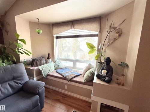 Bedroom featuring wood finished floors and baseboards - 62 Willowby Close, Stony Plain, AB - Indoor