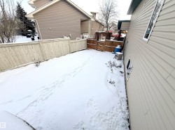 View of yard covered in snow - 