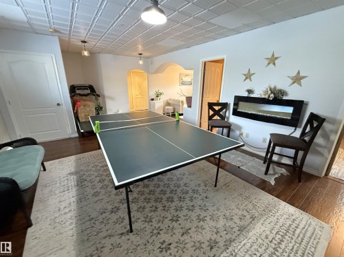 62 Willowby Close, Stony Plain, AB - Indoor Photo Showing Other Room With Fireplace