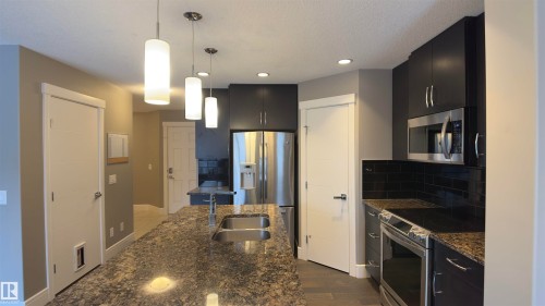 616 175A Street Sw, Edmonton, AB - Indoor Photo Showing Kitchen With Double Sink With Upgraded Kitchen