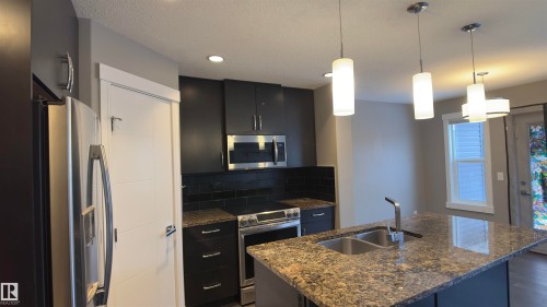 616 175A Street Sw, Edmonton, AB - Indoor Photo Showing Kitchen With Double Sink With Upgraded Kitchen