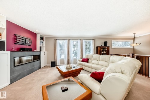 12404 39 Avenue Nw, Edmonton, AB - Indoor Photo Showing Living Room With Fireplace