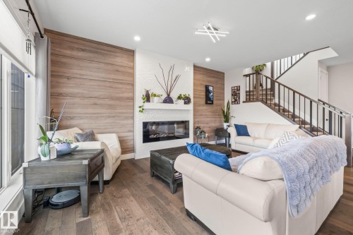 568 Merlin Landing Landing, Edmonton, AB - Indoor Photo Showing Living Room With Fireplace