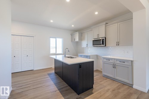 219 Wattle Road, Leduc, AB - Indoor Photo Showing Kitchen With Double Sink