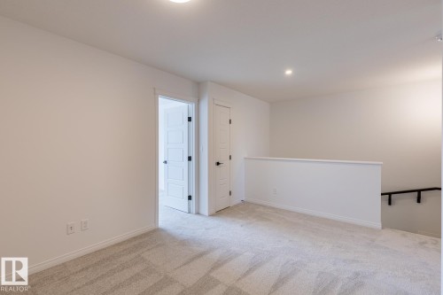 219 Wattle Road, Leduc, AB - Indoor Photo Showing Other Room