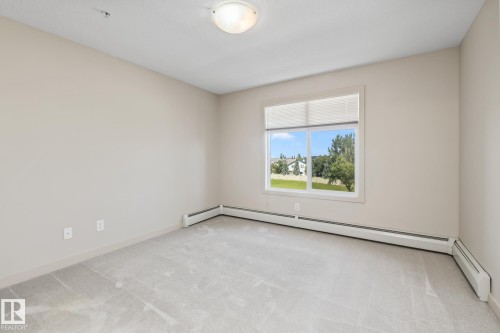 313 11615 Ellerslie Road, Edmonton, AB - Indoor Photo Showing Other Room