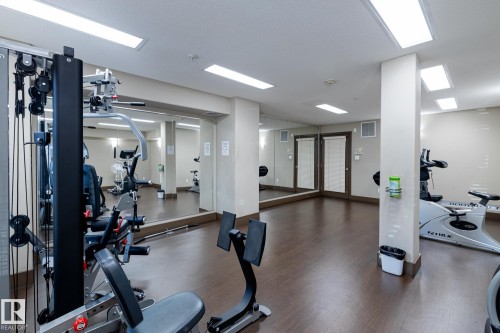 313 11615 Ellerslie Road, Edmonton, AB - Indoor Photo Showing Gym Room