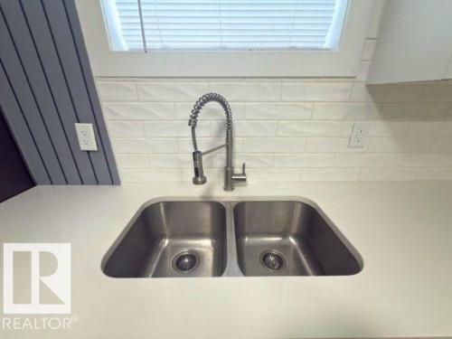 11912 140 Avenue, Edmonton, AB - Indoor Photo Showing Kitchen With Double Sink