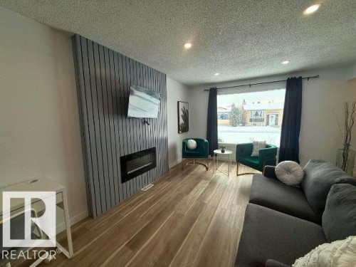 11912 140 Avenue, Edmonton, AB - Indoor Photo Showing Living Room With Fireplace
