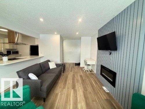 11912 140 Avenue, Edmonton, AB - Indoor Photo Showing Other Room With Fireplace