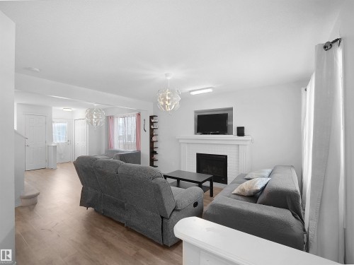 1509 76 Street, Edmonton, AB - Indoor Photo Showing Living Room With Fireplace