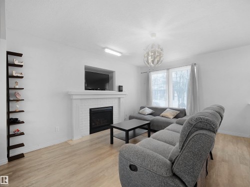 1509 76 Street, Edmonton, AB - Indoor Photo Showing Living Room With Fireplace