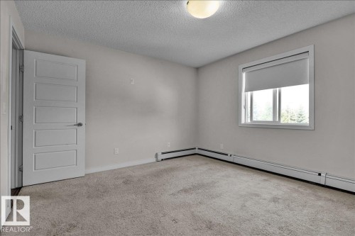 219 14808 125 Street, Edmonton, AB - Indoor Photo Showing Other Room