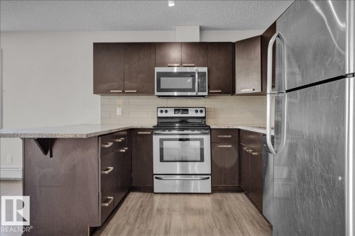 219 14808 125 Street, Edmonton, AB - Indoor Photo Showing Kitchen With Upgraded Kitchen