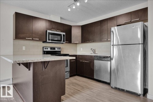 219 14808 125 Street, Edmonton, AB - Indoor Photo Showing Kitchen With Upgraded Kitchen