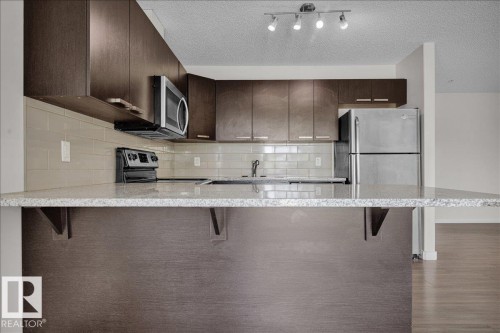 219 14808 125 Street, Edmonton, AB - Indoor Photo Showing Kitchen With Upgraded Kitchen