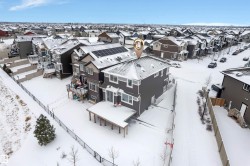 Snowy aerial view with a residential view - 