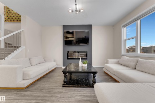 2320 Chokecherry Close, Edmonton, AB - Indoor Photo Showing Living Room With Fireplace