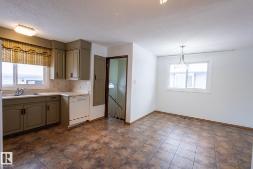 14811 61A Street, Edmonton, AB - Indoor Photo Showing Kitchen With Double Sink