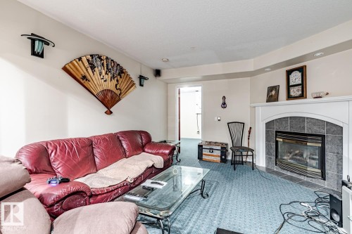 4522 53 Avenue, Leduc, AB - Indoor Photo Showing Living Room With Fireplace