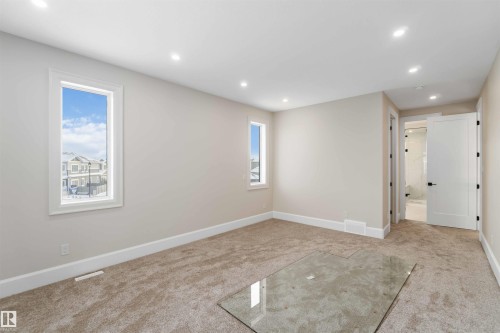 3406 Soleil Boulevard, Beaumont, AB - Indoor Photo Showing Other Room