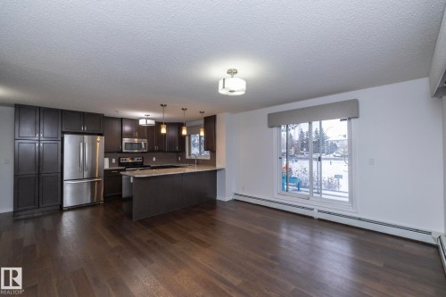 102 2203 44 Avenue, Edmonton, AB - Indoor Photo Showing Kitchen With Stainless Steel Kitchen