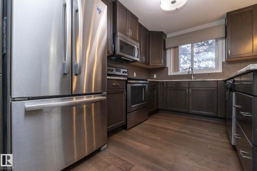 102 2203 44 Avenue, Edmonton, AB - Indoor Photo Showing Kitchen With Stainless Steel Kitchen