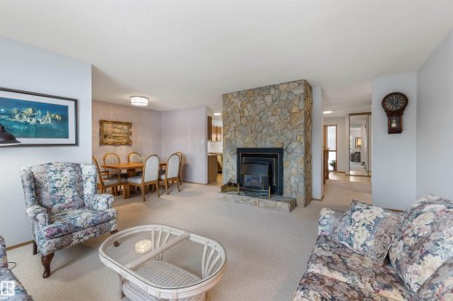 10854 11 Avenue, Edmonton, AB - Indoor Photo Showing Living Room With Fireplace