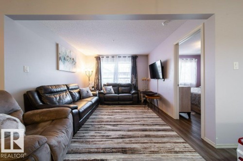 105 5951 165 Avenue, Edmonton, AB - Indoor Photo Showing Living Room