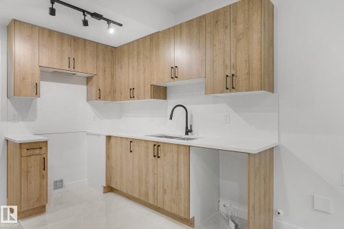 9926 157 Street, Edmonton, AB - Indoor Photo Showing Kitchen With Double Sink