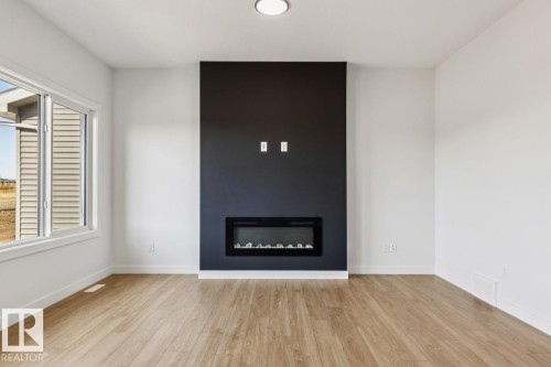 2840 65 Street, Edmonton, AB - Indoor Photo Showing Living Room With Fireplace