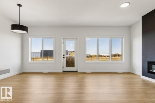2840 65 Street, Edmonton, AB - Indoor Photo Showing Living Room With Fireplace