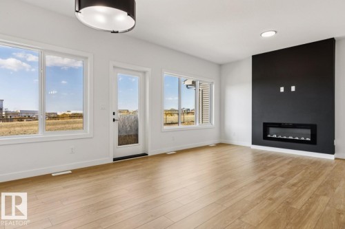 2840 65 Street, Edmonton, AB - Indoor Photo Showing Living Room With Fireplace