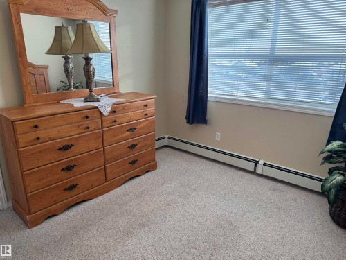 427 8802 Southfort Drive, Fort Saskatchewan, AB - Indoor Photo Showing Bedroom