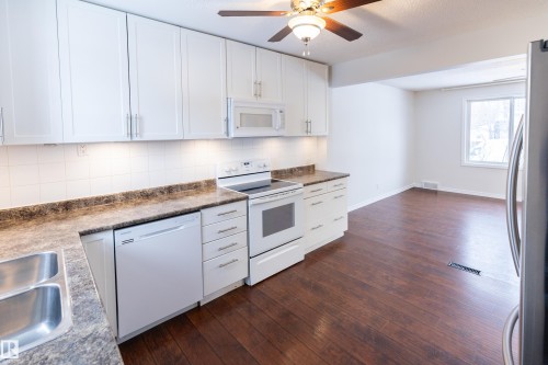 8335 76 Avenue, Edmonton, AB - Indoor Photo Showing Kitchen With Double Sink
